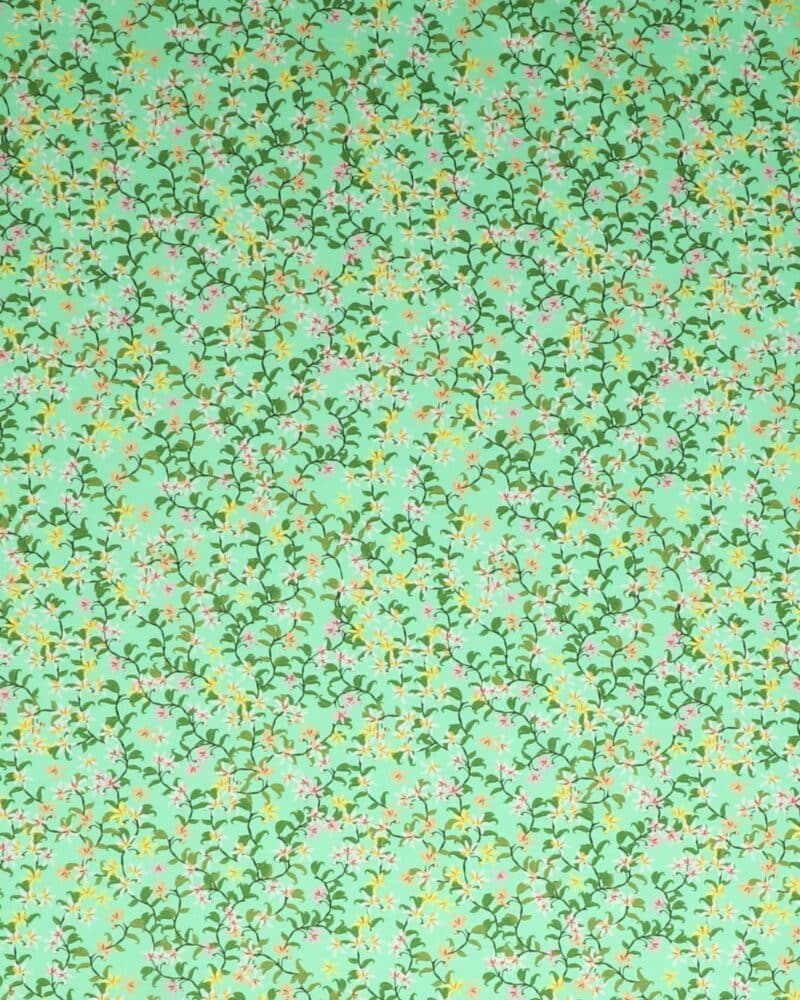 Blomstersnerler på lys grøn - Jersey - Stoffabrics
