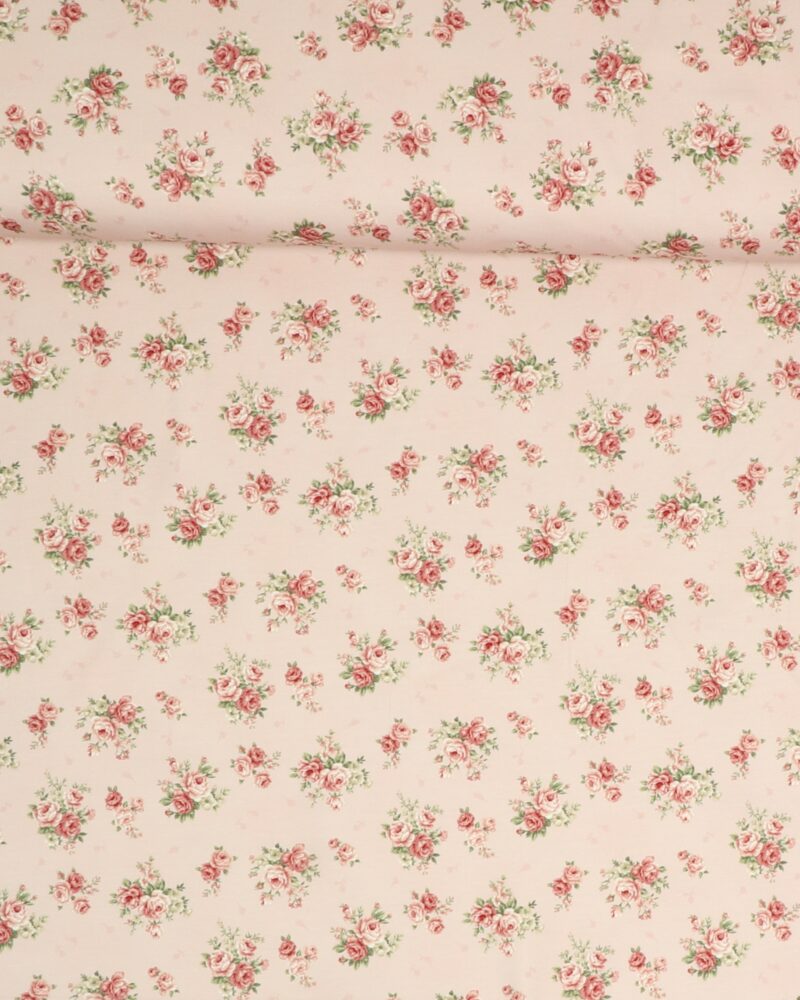 Små buketter af roser på lyserød bund - Jersey - Stoffabrics