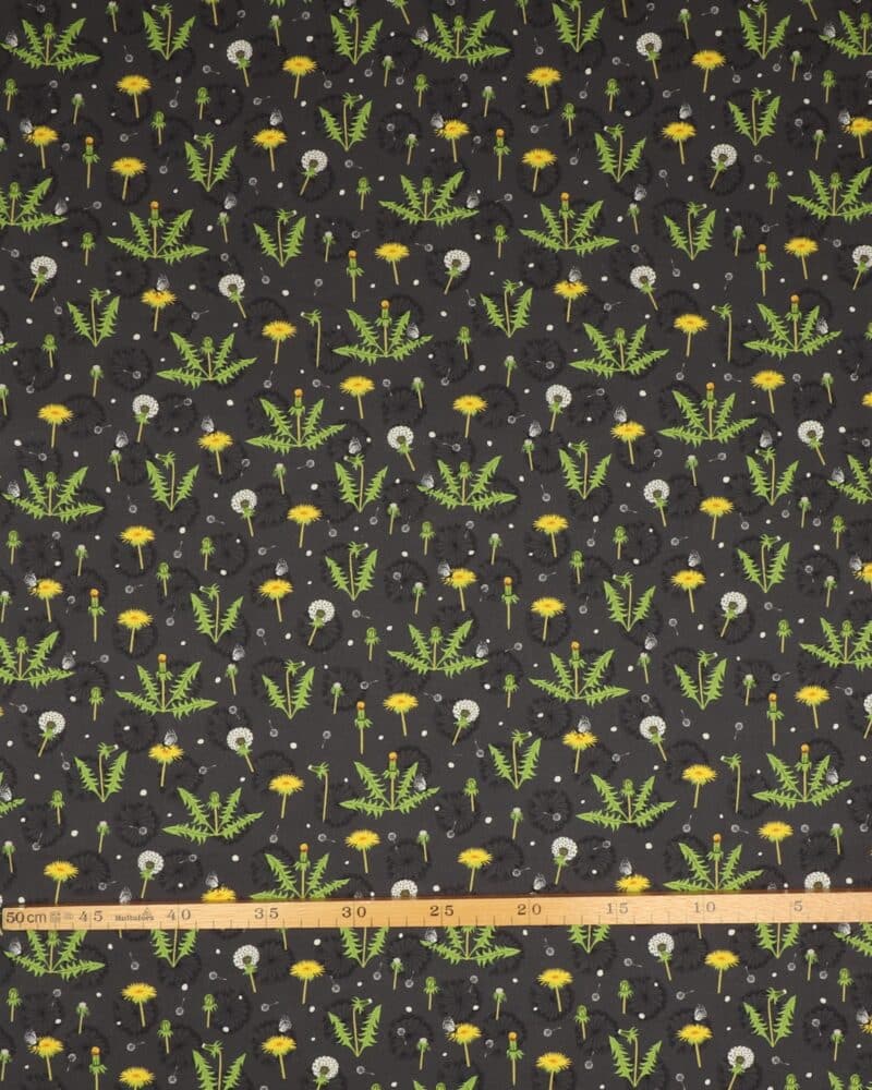 Mælkebøtter og mælkebøttefrø på mørkegrå - Patchwork - Stoffabrics