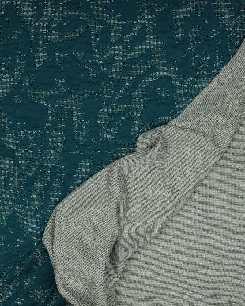 Petroleumsgrøn med mønster - Polyester/bomuld jersey - Info mangler