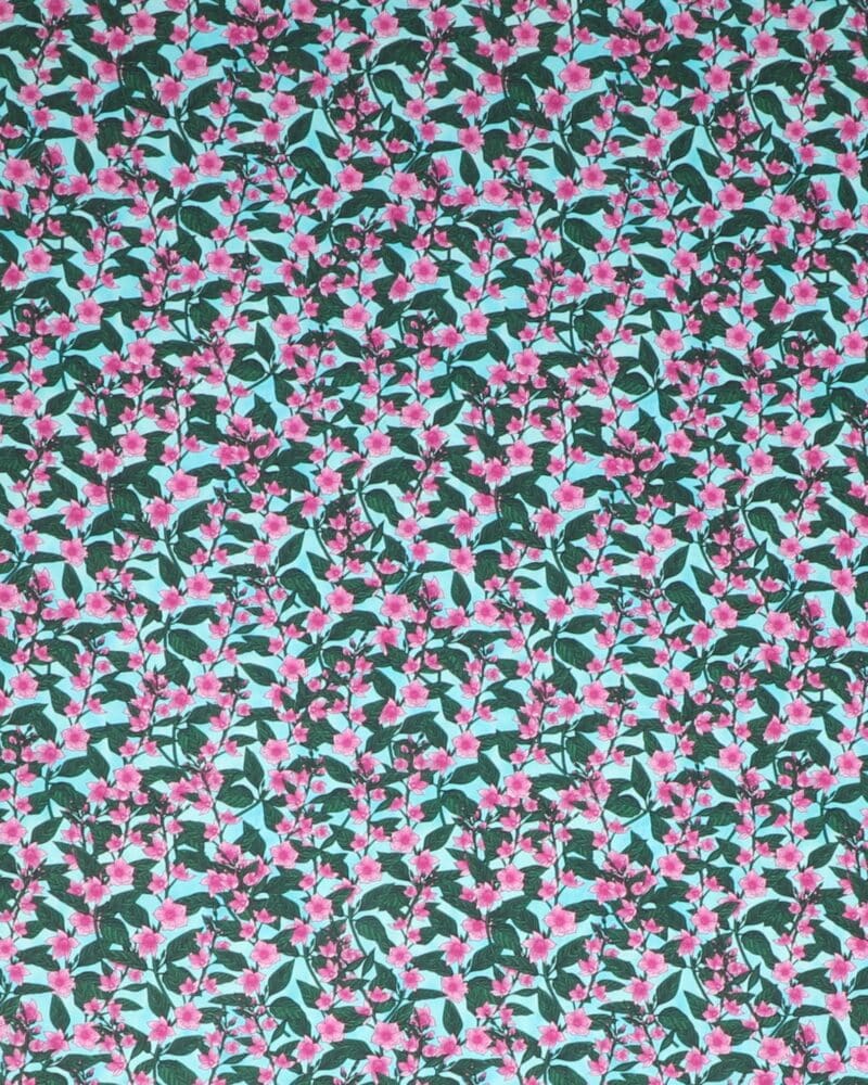 Cerisefarvet blomster på bund af turkise farver - Patchwork - Stoffabrics